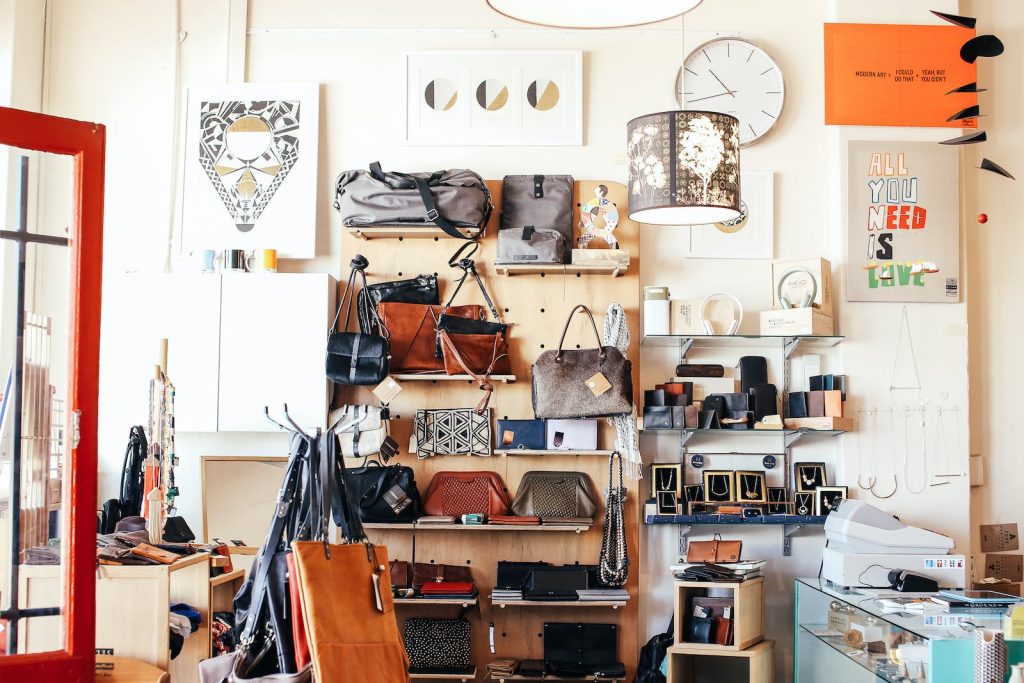 Assorted purses on shelves in shop